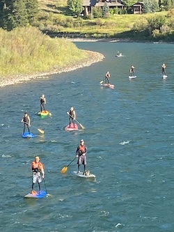 Alpine skiers take a break for paddleboarding